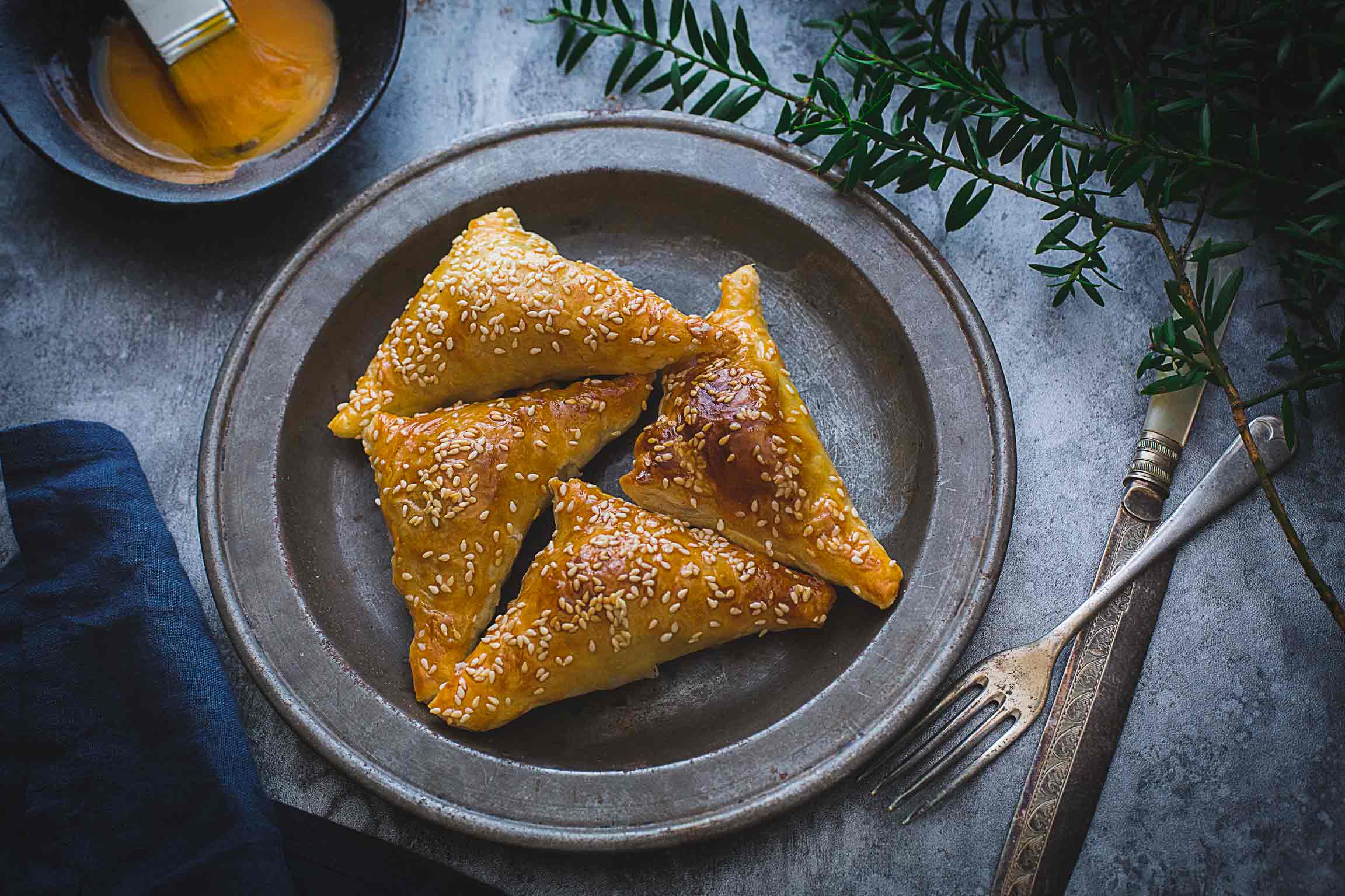 five spice pork and onion pastry triangles