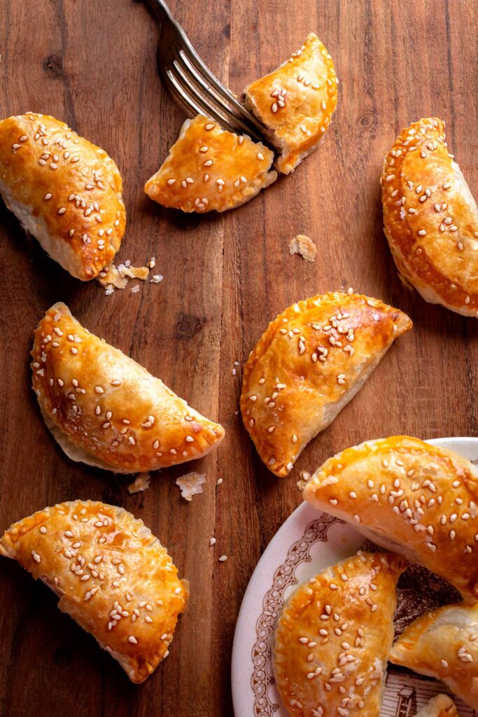 baked dumplings ready to be served. fork cut through