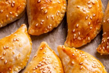 baked dumplings just out of oven on the baking sheet