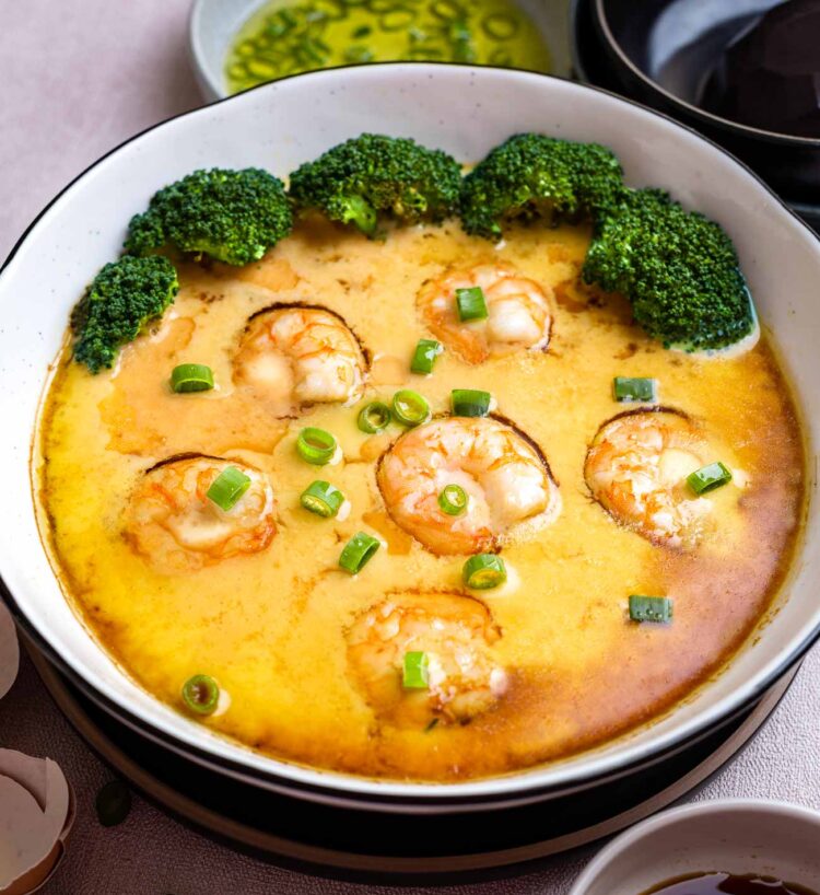 Chinese steamed eggs and tofu. Steamed Eggs, tofu, broccoli and shrimps.