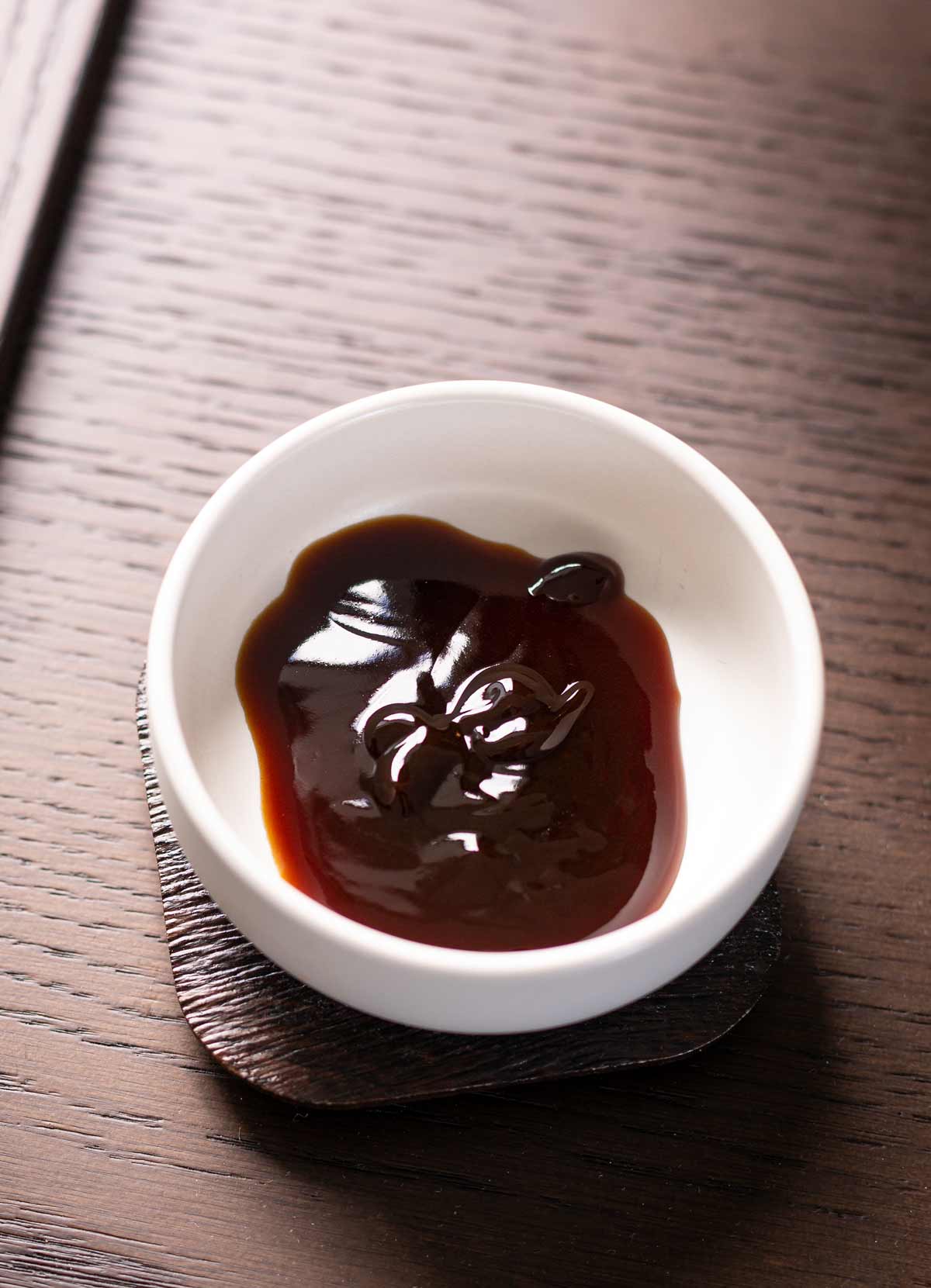 What is oyster sauce? Oyster sauce is a thick, syrupy condiment made from oyster extract. It offers an earthy, slightly sweet, and salty flavor.